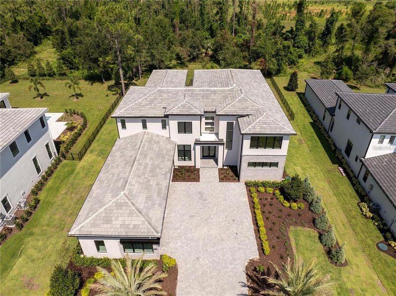 Front exterior of a new home in , Montverde, FL, highlighting curb appeal (Image 27).