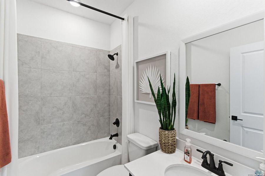 Furnished interior view inside a new home in Centero at Stone Oak, San Antonio (Image 19).