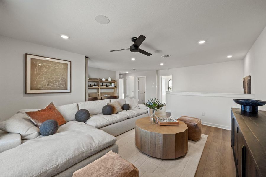 Photo of Pulte model home with same floor plan, not of actual home listed.