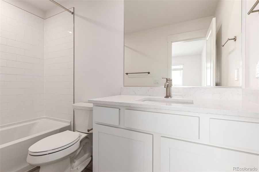 Furnished interior view inside a new home in Ascent at Inverness, Englewood (Image 6).