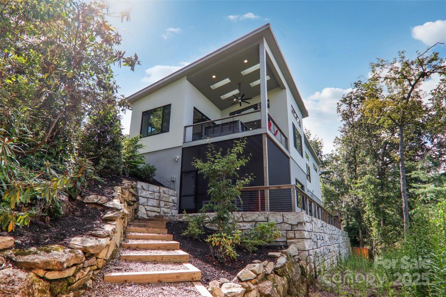 Front exterior of a new home in , Hendersonville, NC, highlighting curb appeal (Image 18).