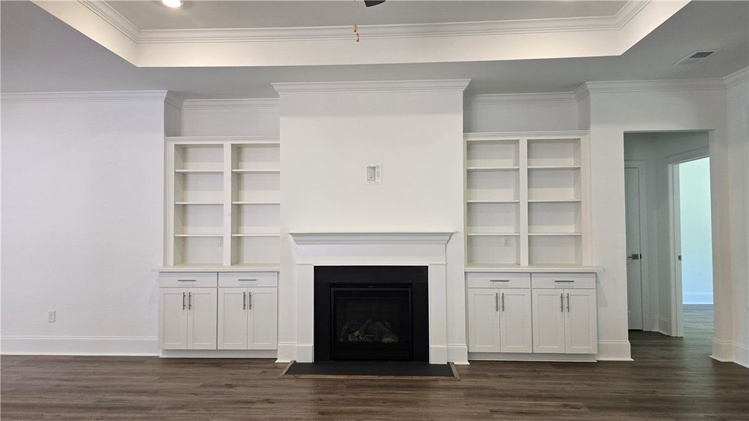 A refined living space showcasing a fireplace flan