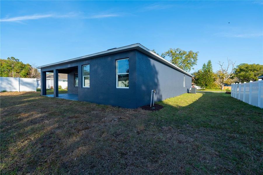 Exterior details and patio area of a home in , Tavares (Image 32).