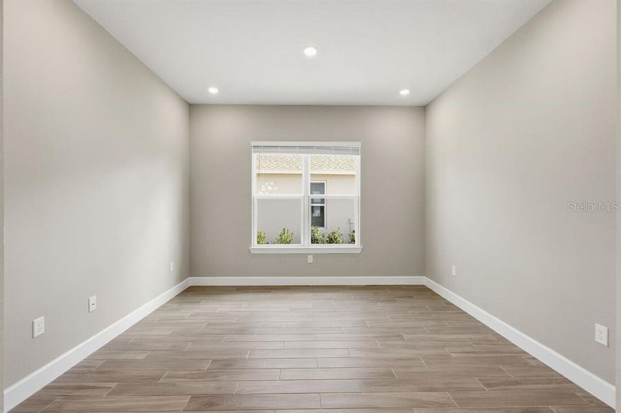 Spacious, unfurnished interior of a new home in Esplanade at Westview, Kissimmee (Image 29).