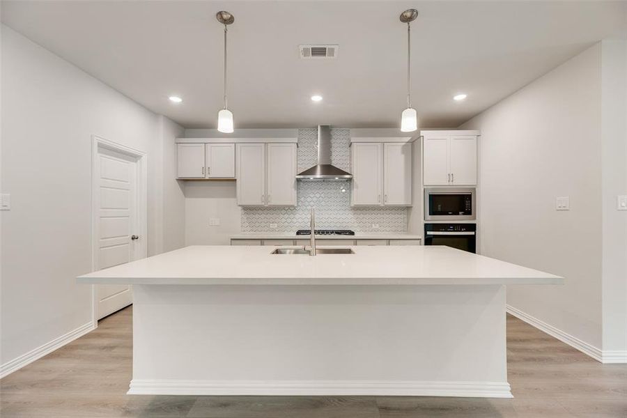 Furnished interior view inside a new home in Villages of Hurricane Creek, Anna (Image 10).