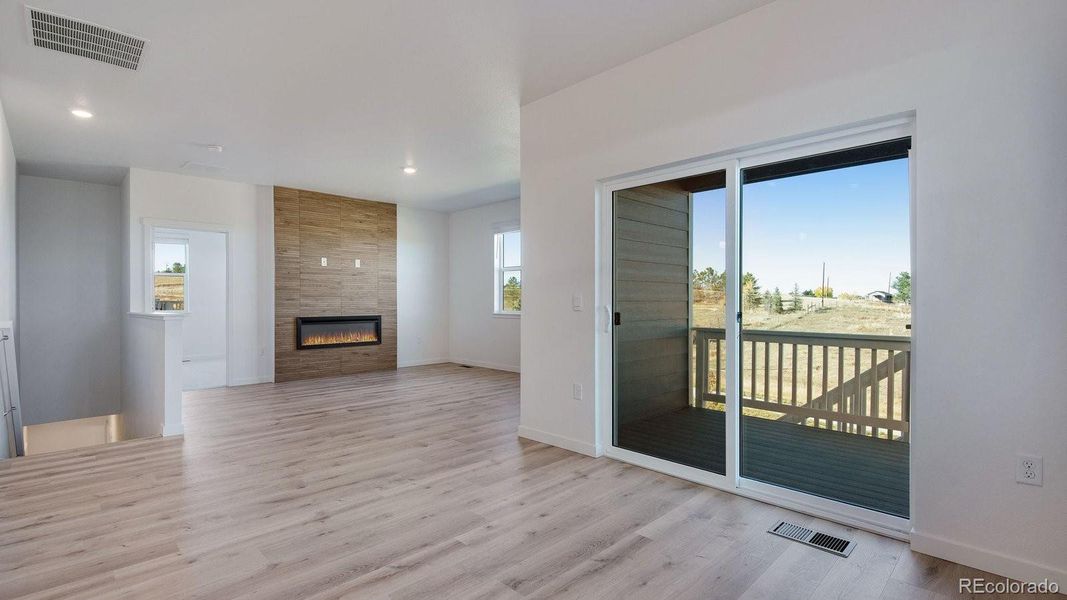 Spacious, unfurnished interior of a new home in Trails at Crowfoot, Parker (Image 20).