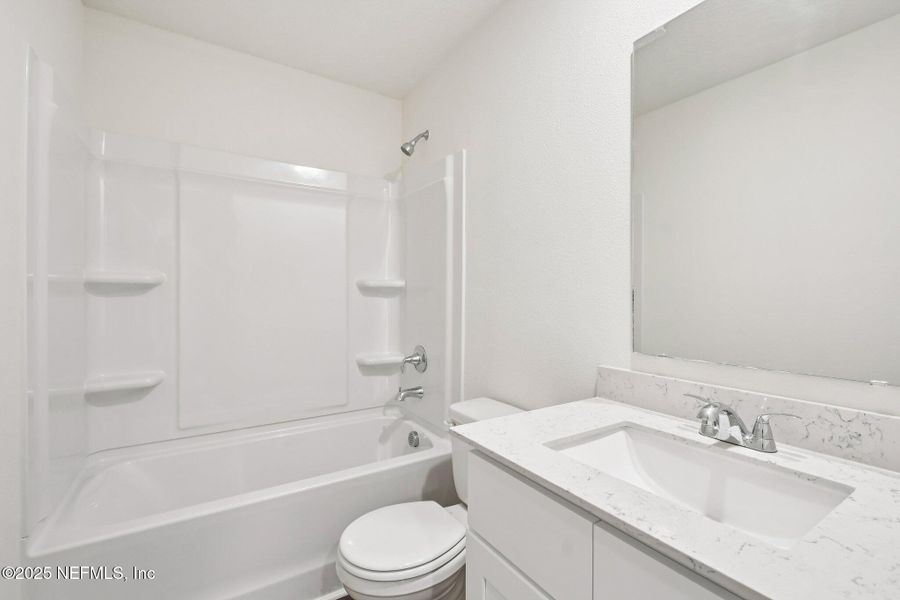 Furnished interior view inside a new home in Kings Landing, Jacksonville (Image 9).