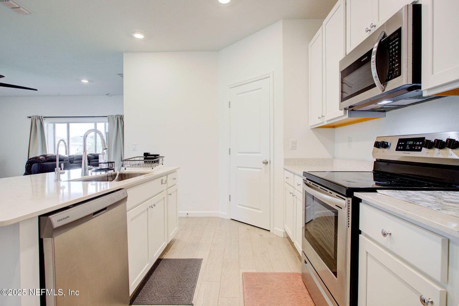 Furnished interior view inside a new home in , Green Cove Springs (Image 28).