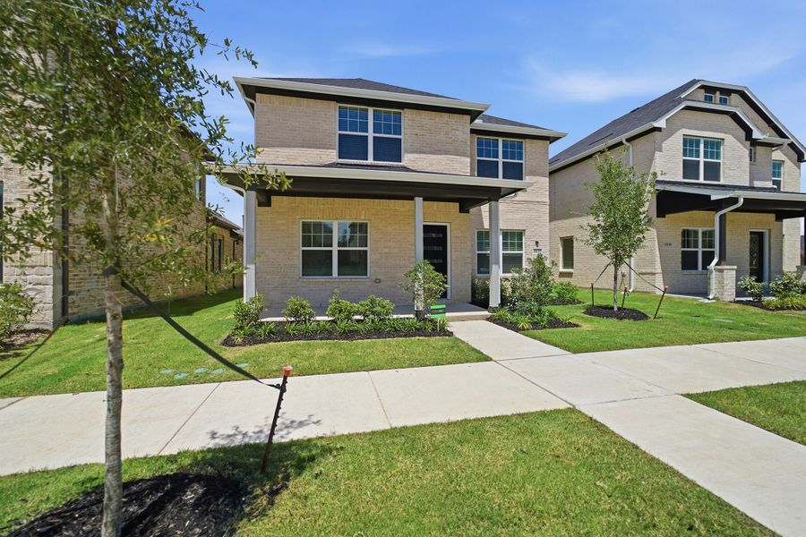 Front exterior of a new home in La Terra, Celina, TX, highlighting curb appeal (Image 20). Front exterior of a new home in La Terra, Celina, TX, highlighting curb appeal (Image 20).