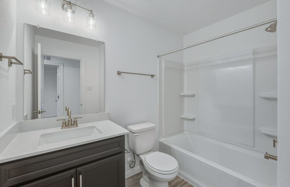Furnished interior view inside a new home in Wolf Ranch, Georgetown (Image 9).