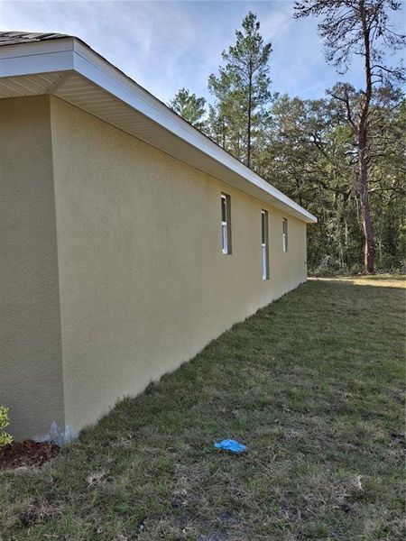Exterior details and patio area of a home in , Inverness (Image 3).