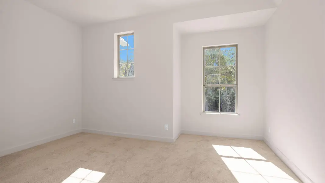 Spacious, unfurnished interior of a new home in The Woodlands Hills 75', Willis (Image 3).