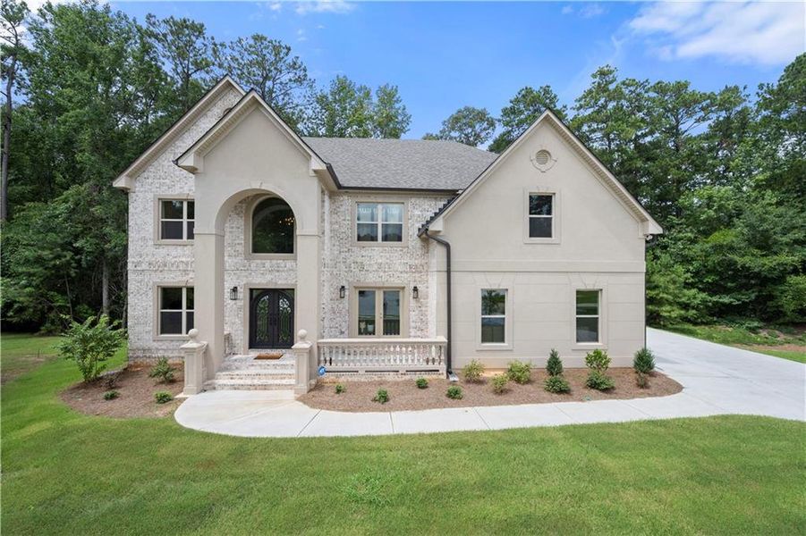Front exterior of a new home in , Fairburn, GA, highlighting curb appeal (Image 21). Front exterior of a new home in , Fairburn, GA, highlighting curb appeal (Image 21).