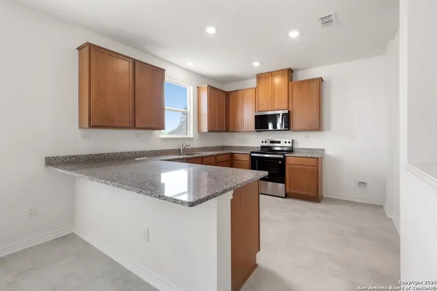 Furnished interior view inside a new home in Southton Cove, Elmendorf (Image 6).