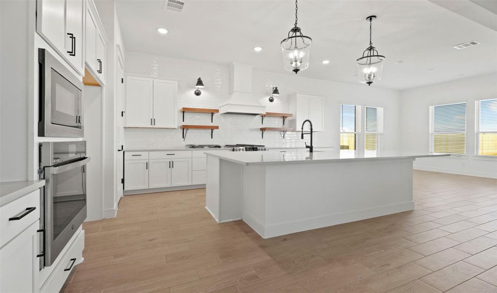 Gourmet island kitchen (*Photo not of actual home and used for illustration purposes only.) Gourmet island kitchen (*Photo not of actual home and used for illustration purposes only.)