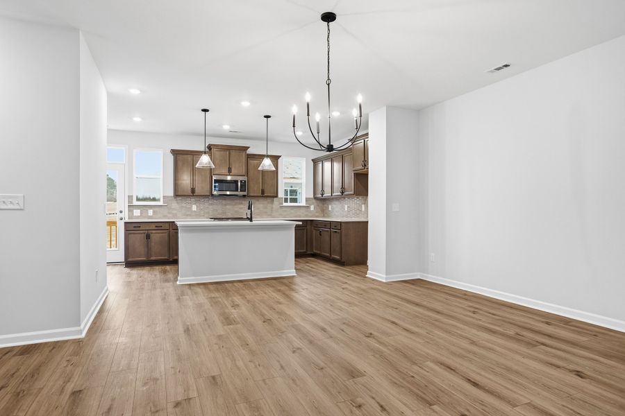Furnished interior view inside a new home in Renaissance at White Oak, Garner (Image 8).
