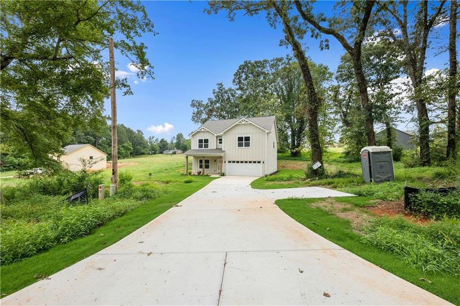 Front exterior of a new home in , Clarkesville, GA, highlighting curb appeal (Image 24). Front exterior of a new home in , Clarkesville, GA, highlighting curb appeal (Image 24).