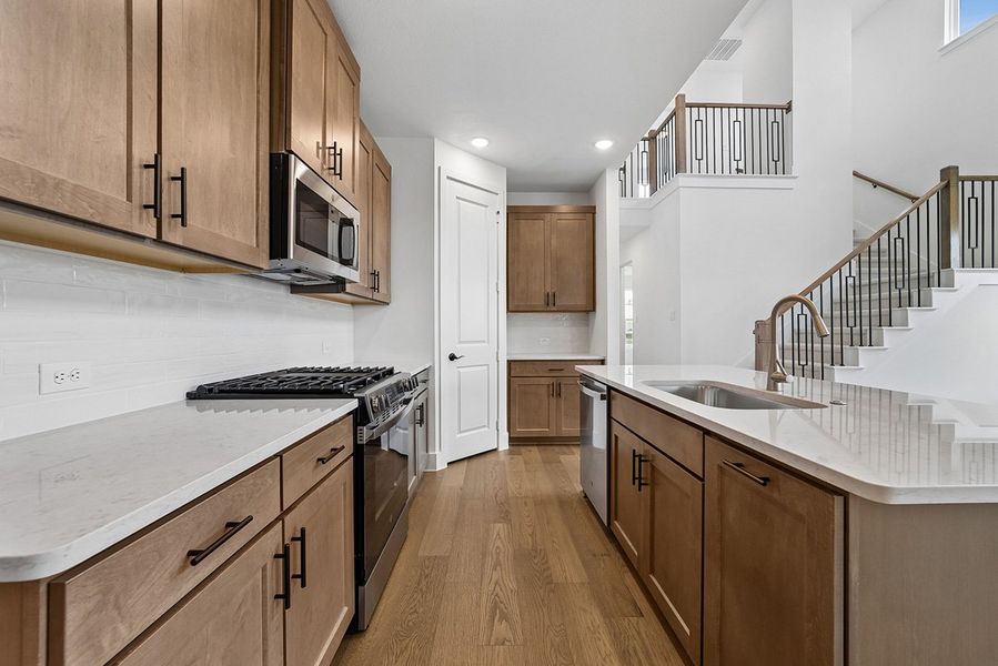 Representative furnished interior of a home built from the Ellis by Landon Homes in Fields - East Village, Frisco (Image 7).