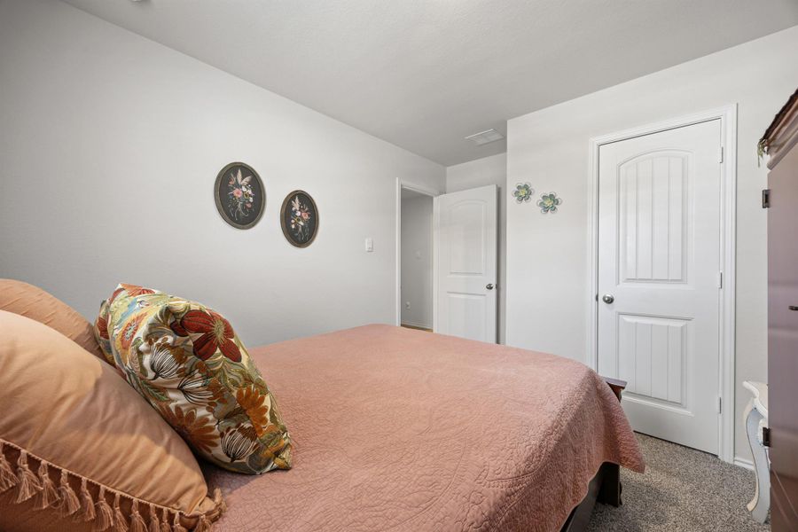 Bedroom featuring carpet flooring