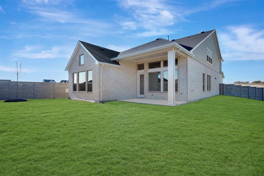Exterior details and patio area of a home in Treeline, Justin (Image 23).