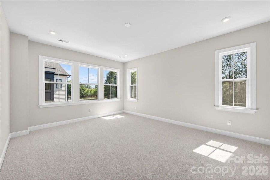 Light filled primary bedroom Light filled primary bedroom