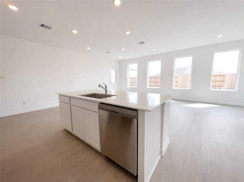 Furnished interior view inside a new home in Sunterra, Katy (Image 10).