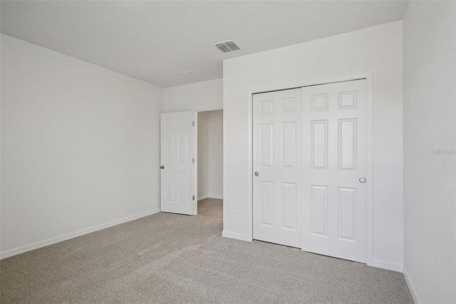 Spacious, unfurnished interior of a new home in Springs at Lake Alfred - Classic Series, Lake Alfred (Image 20).