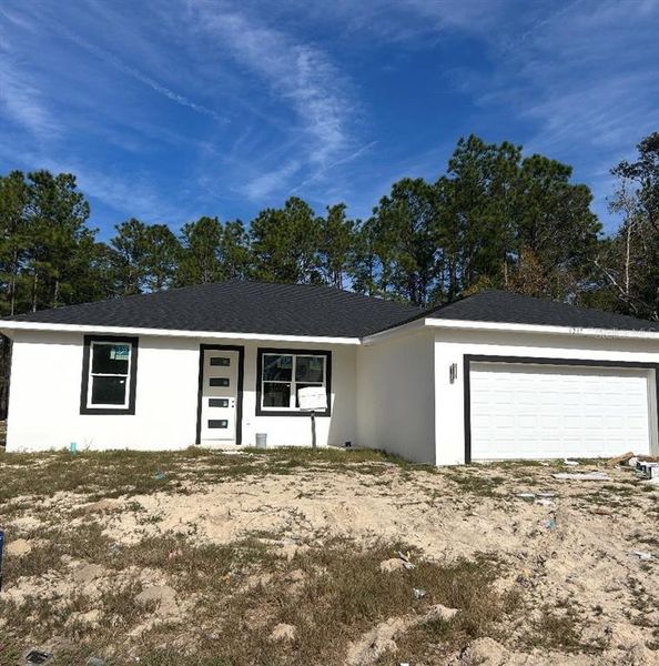 Front exterior of a new home in , Ocala, FL, highlighting curb appeal (Image 21).