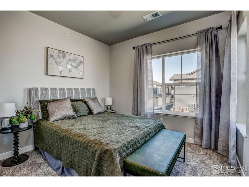 Furnished interior view inside a new home in The Lakes at Centerra - Discovery, Loveland (Image 19).