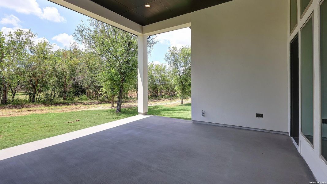 Exterior details and patio area of a home in Megan's Landing, Castroville (Image 3).