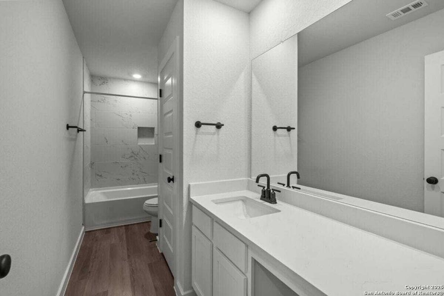 Furnished interior view inside a new home in August Fields, New Braunfels (Image 12).