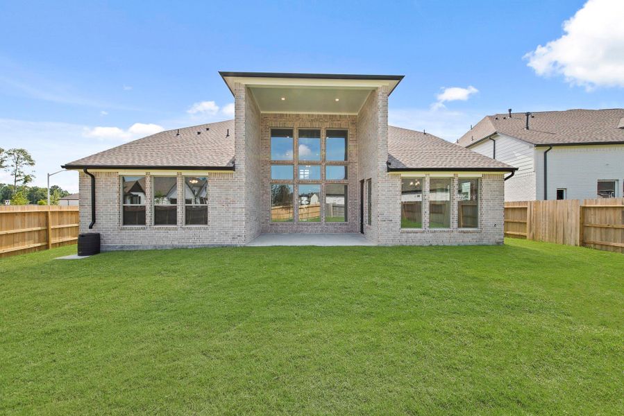 Front exterior of a new home in ARTAVIA® - 60', Conroe, TX, highlighting curb appeal (Image 1).