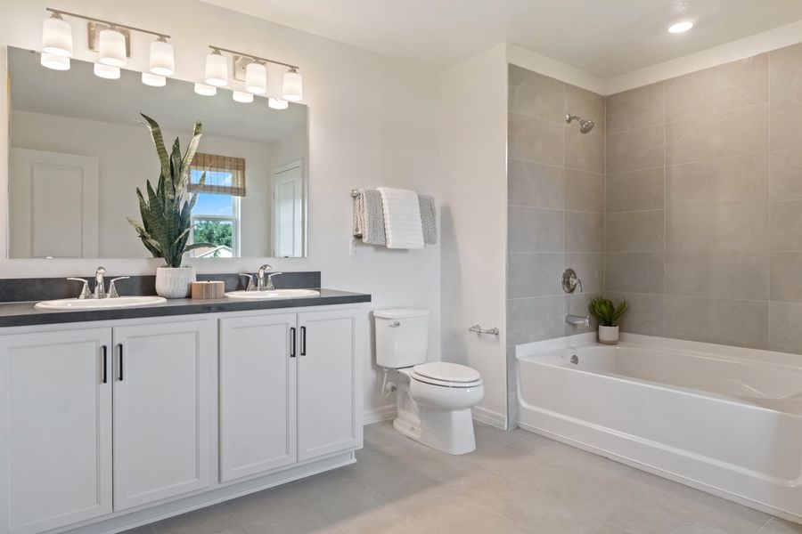 Dual-sink vanity at primary bath