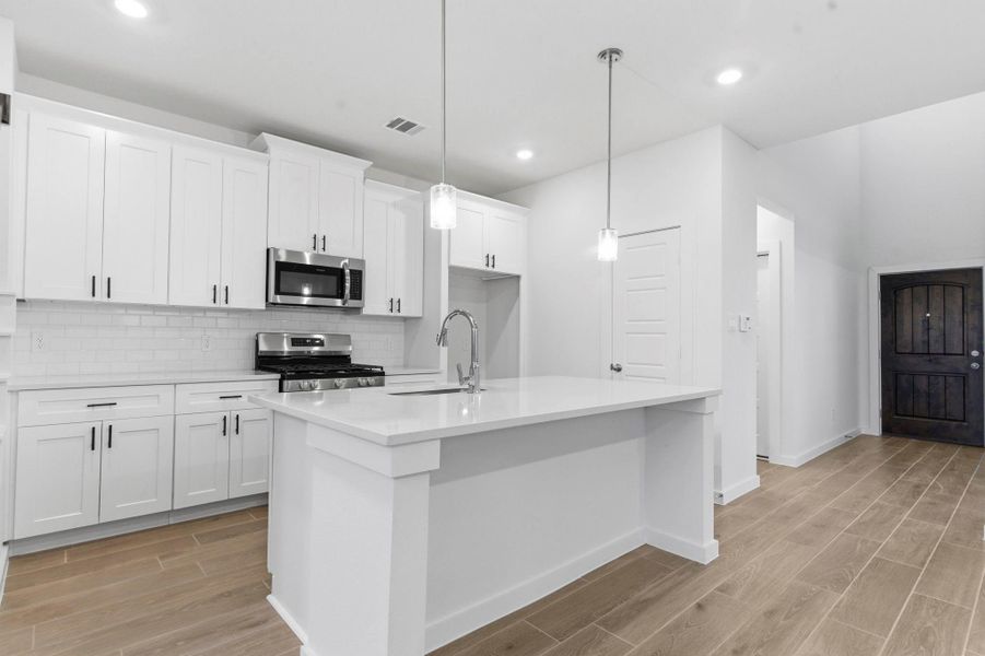 Furnished interior view inside a new home in , Iowa Colony (Image 11).