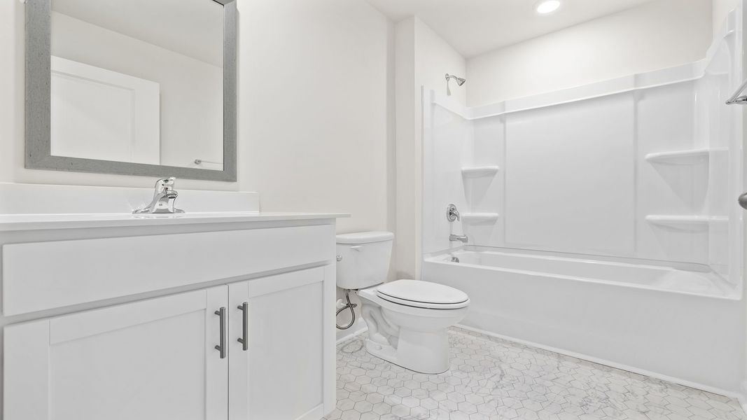 Furnished interior view inside a new home in Lakestone, Woodruff (Image 5).