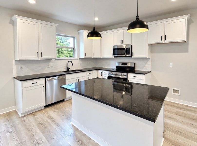 Furnished interior view inside a new home in Hickory Cove, Burns (Image 9).