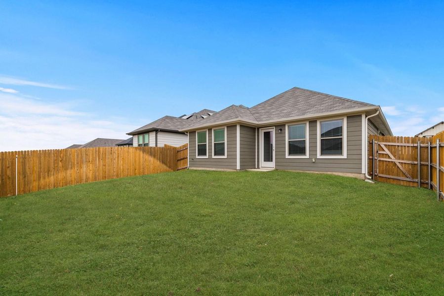 Exterior details and patio area of a home in Trinity Ranch, Elgin (Image 4).