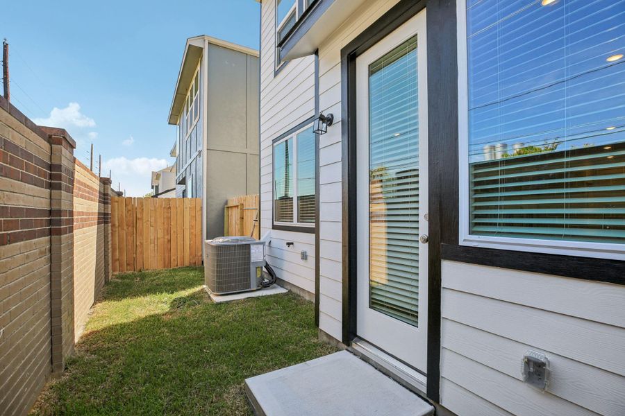 Exterior details and patio area of a home in Spring Brook Village - City Series, Houston (Image 2).