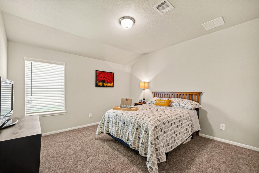 Furnished interior view inside a new home in Sweetgrass Village, Crosby (Image 16).