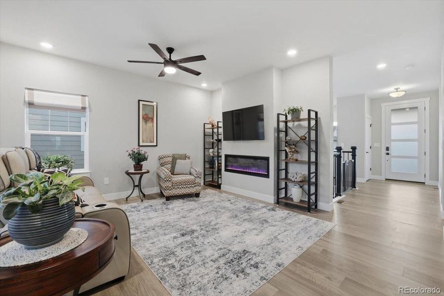 The focal point of the living room is this beautiful fireplace with TV mount over it.