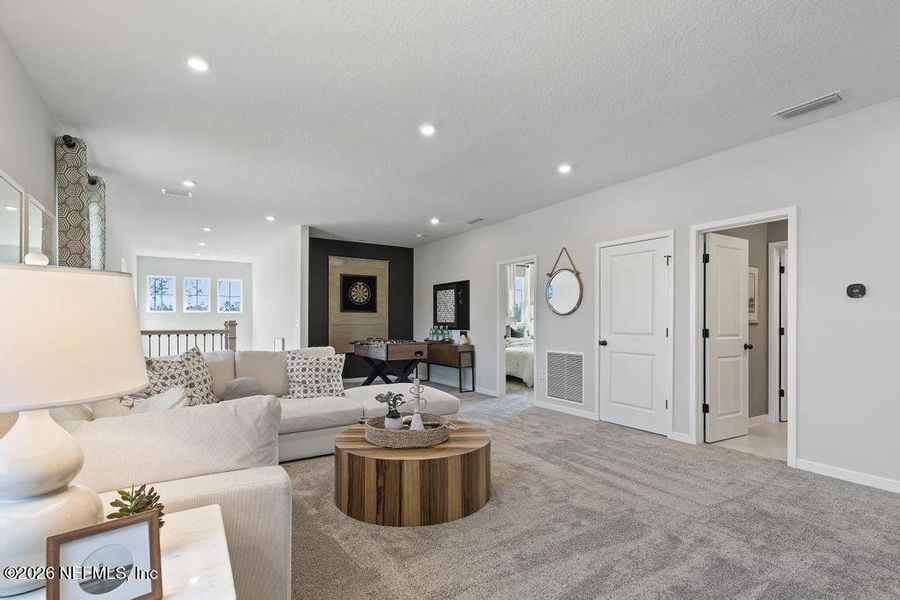 Furnished interior view inside a new home in Seminole Palms, Palm Coast (Image 12).