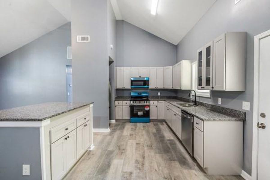 Furnished interior view inside a new home in , Carrollton (Image 6).