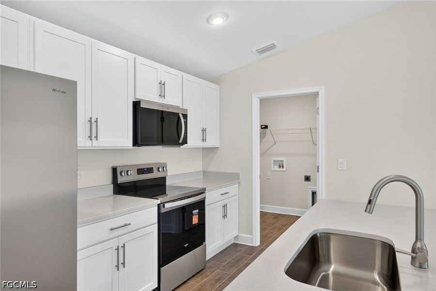 Furnished interior view inside a new home in Cape Coral, Cape Coral (Image 7). Furnished interior view inside a new home in Cape Coral, Cape Coral (Image 7).
