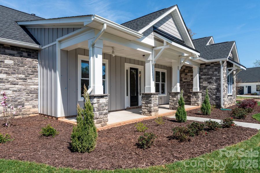 Exterior details and patio area of a home in Bailey's Glen, Huntersville (Image 26).