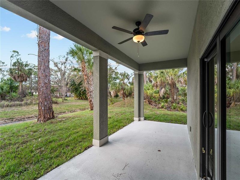 Exterior details and patio area of a home in , North Port (Image 27).