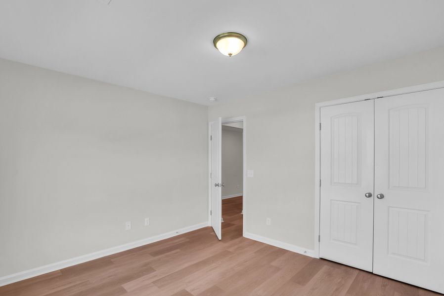 Representative unfurnished interior of a home built from the The Aspen by Smith Family Homes in Sweetwater, Brunswick (Image 24).