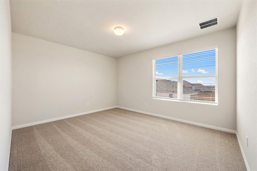 Spacious, unfurnished interior of a new home in The Colony 45s, Bastrop (Image 28).