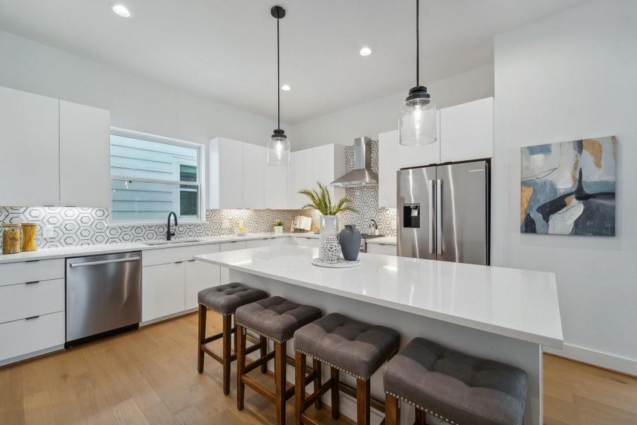 Photos show similar floor plan & alternative finishes from the previous development. Selections may vary.