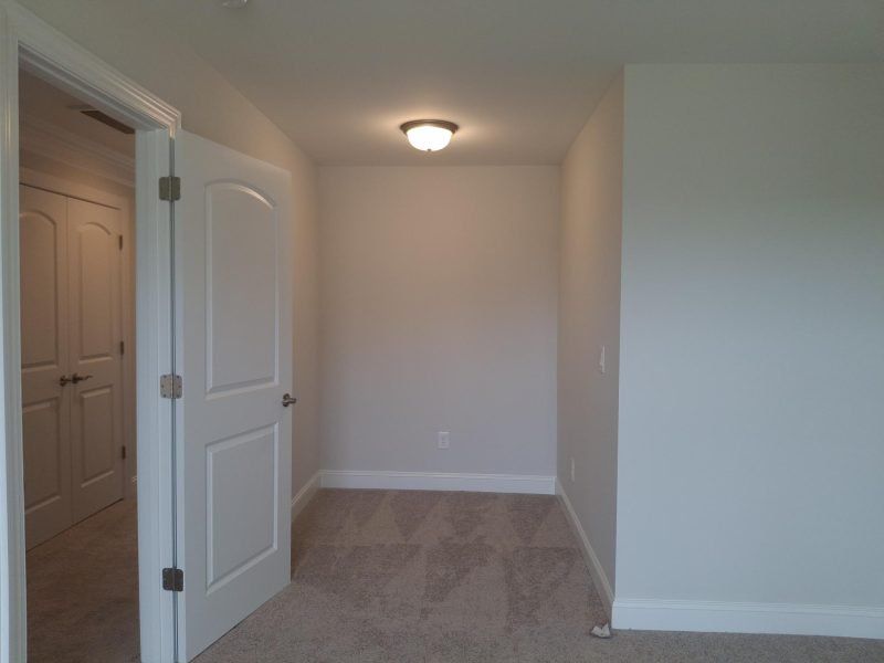 Spacious, unfurnished interior of a new home in Weybridge, Burlington (Image 59).