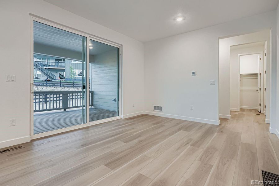 Spacious, unfurnished interior of a new home in Macanta: The Grand Collection, Castle Rock (Image 11).